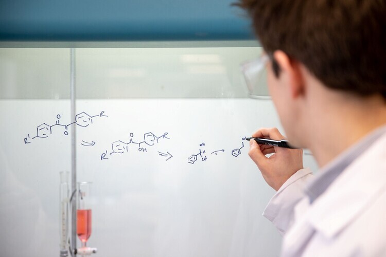 Writing a reaction mechanism on a transparent board