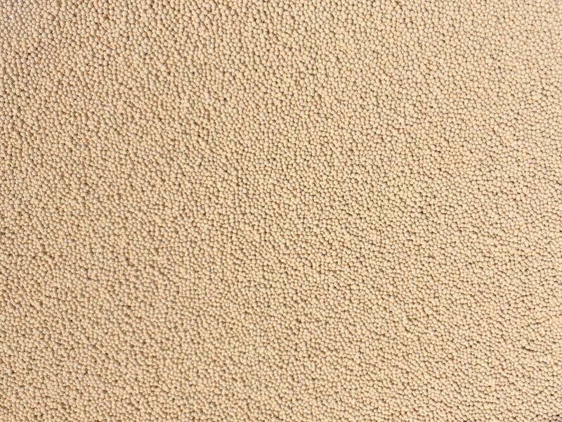 Beige bead-shaped molecular sieves